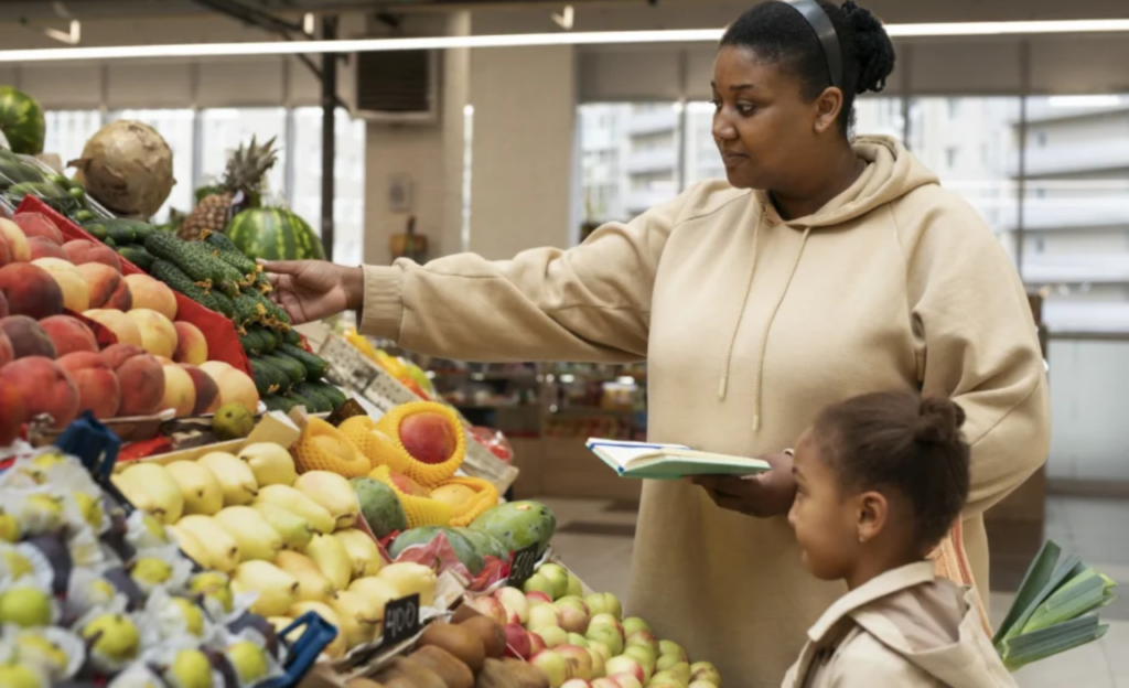Woman checking food labels while shopping for an elimination diet 